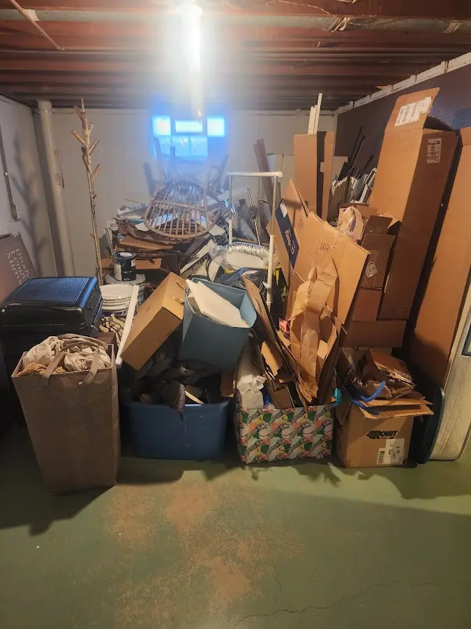 Roll-off dumpster container at job site for Concrete Dumpster Rental in Quincy